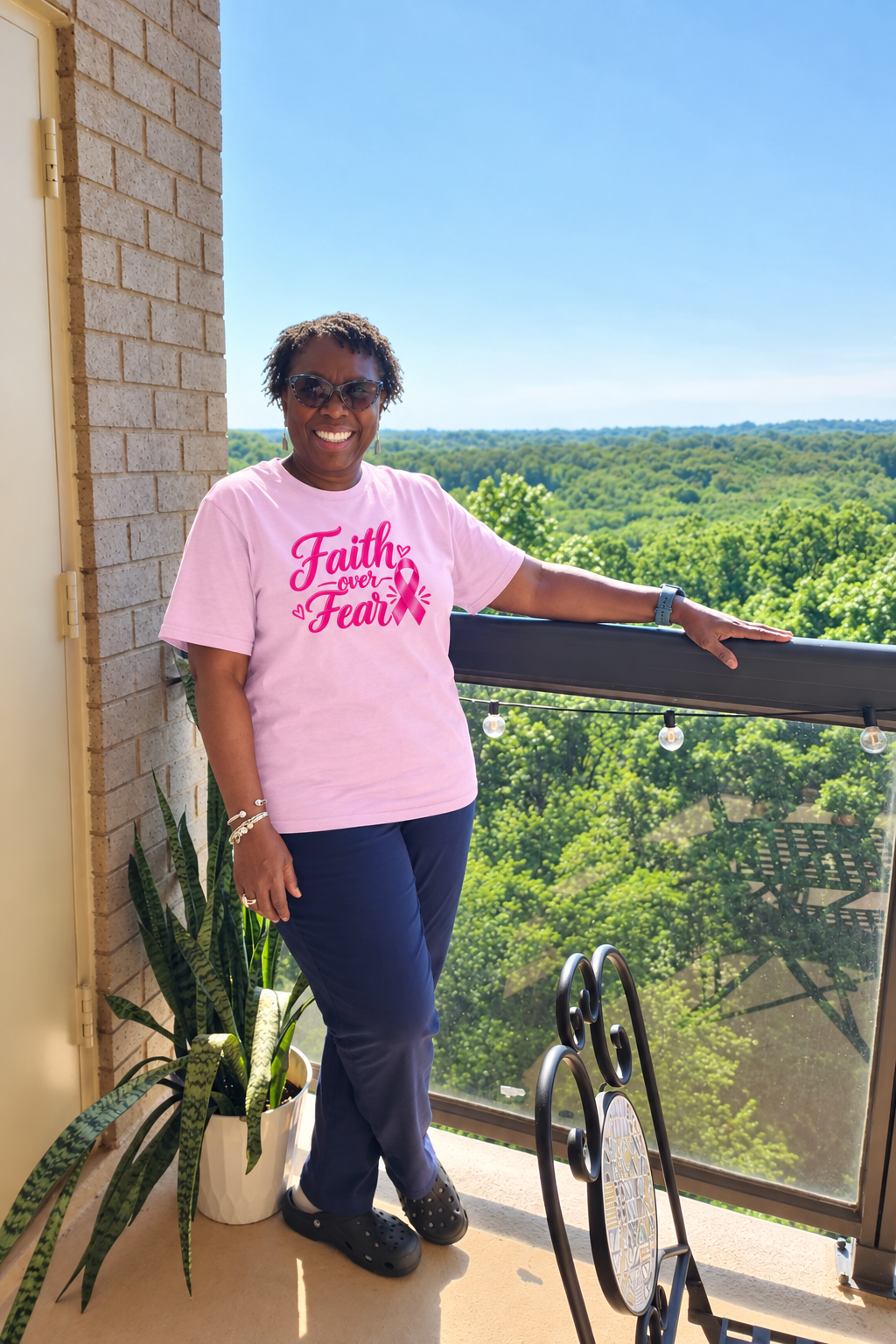 Standing soft-pink Faith over Fear tee preview