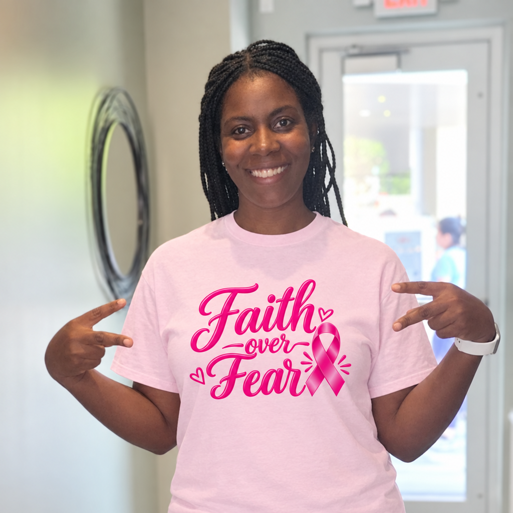 Your friend wearing the soft-pink Faith over Fear tee